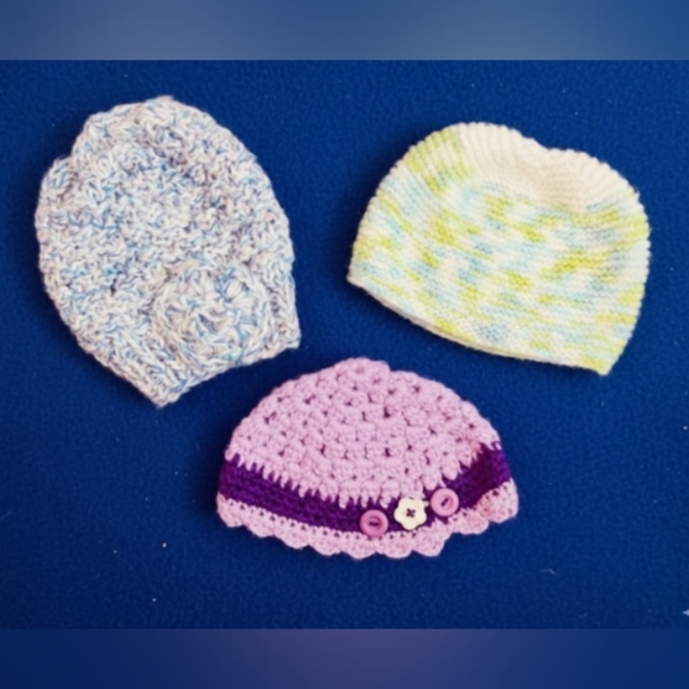 Three new handmade knitted / crocheted toddler hats.